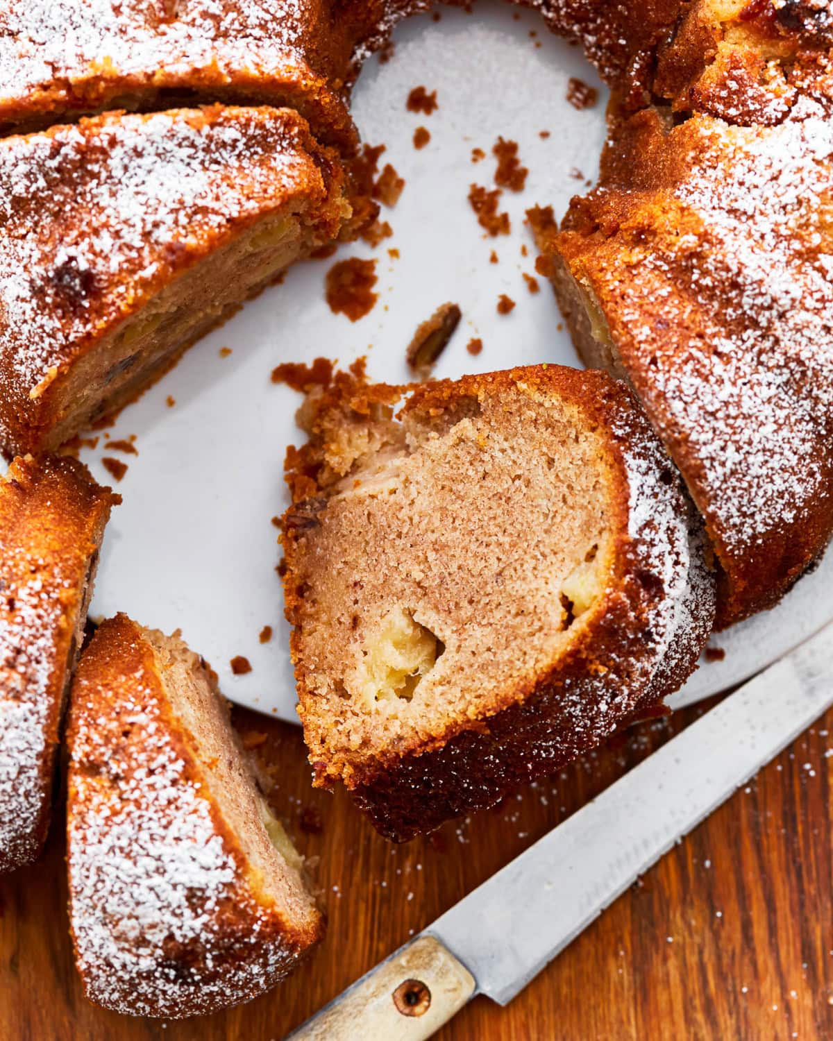 Over head view of a slice of gluten-free apple cake.