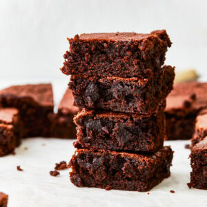 4 stacked gluten free brownies.