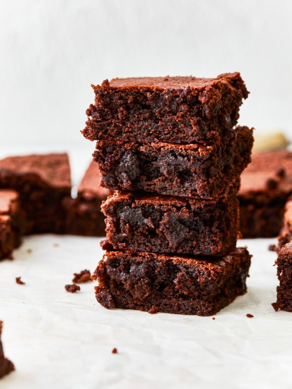4 stacked gluten free brownies.