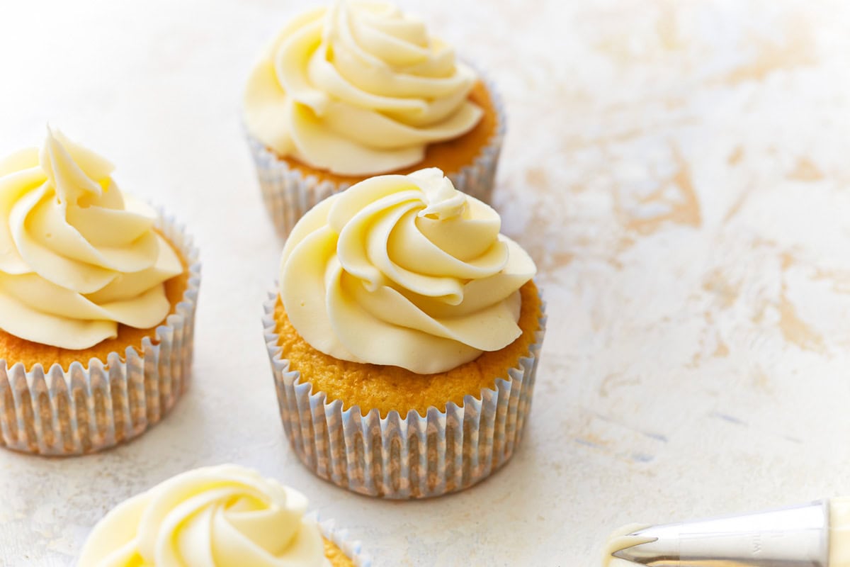 3 gluten-free vanilla cupcakes.