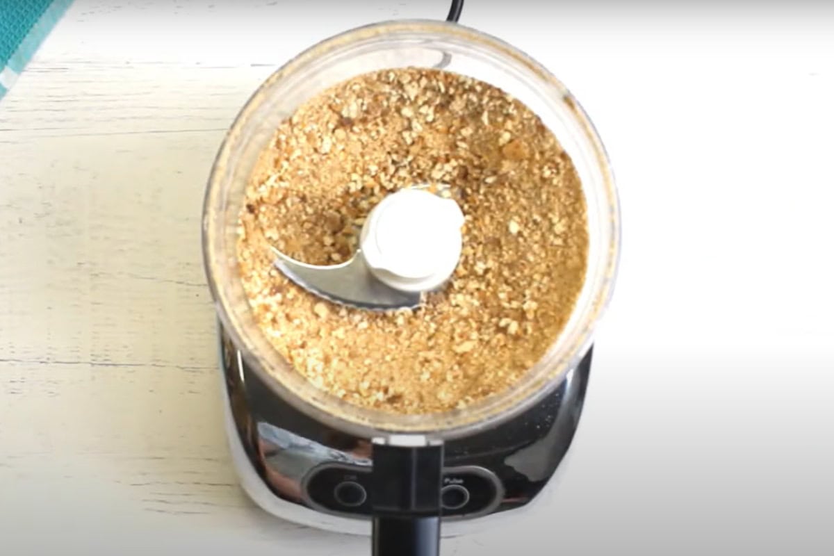 Gluten-free bread crumbs in a food processor.