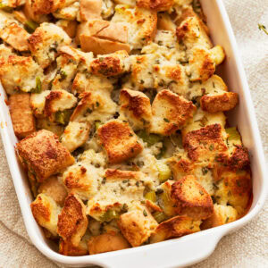 Close up of gluten-free stuffing in a baking dish