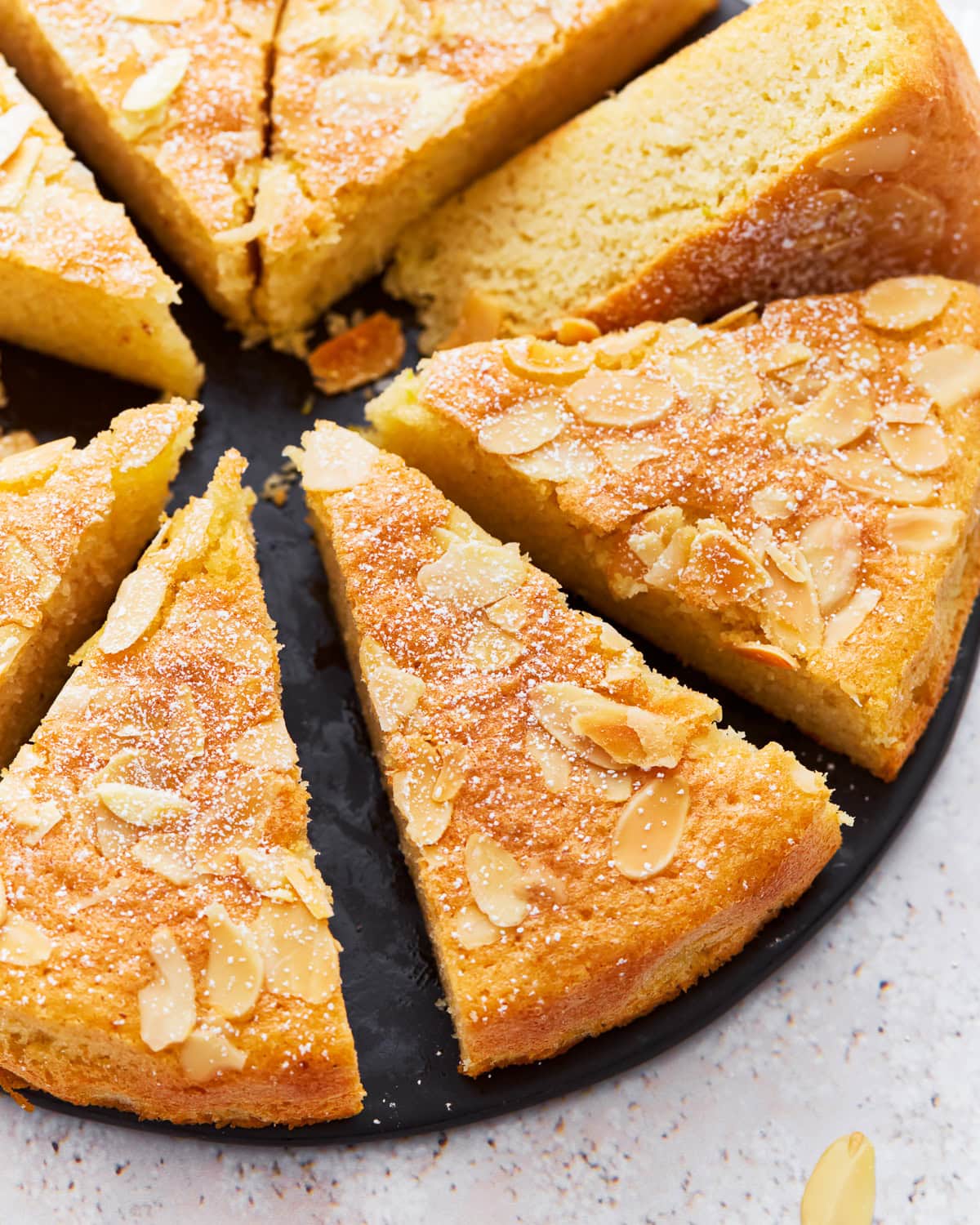 Almond flour cake cut into slices.