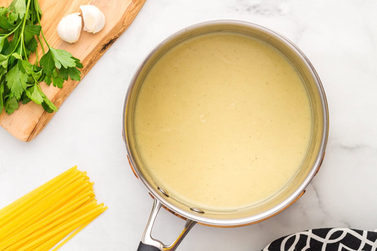 dairy free alfredo sauce in a pan.