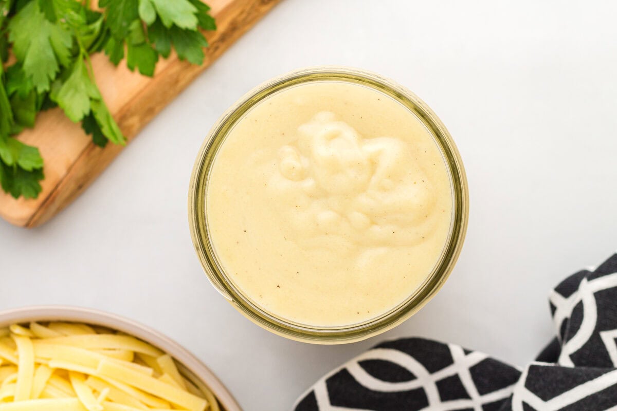 thickened dairy free alfredo sauce in a bowl.