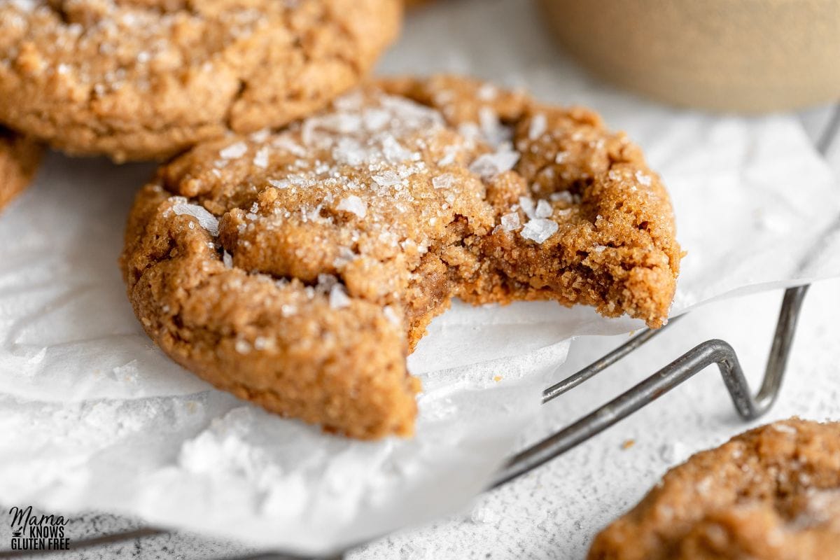 A Flourless Peanut Butter Cookie cooking down on parchment paper.