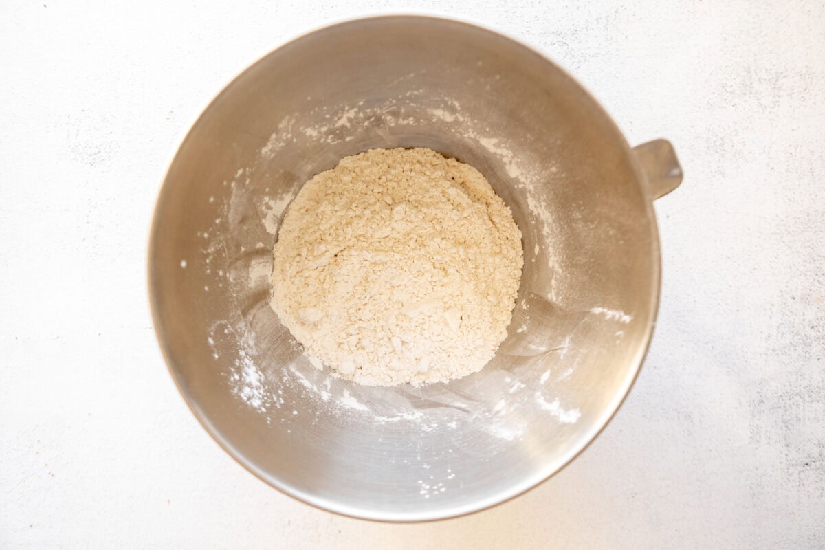 flour in a stainless mixing bowl.
