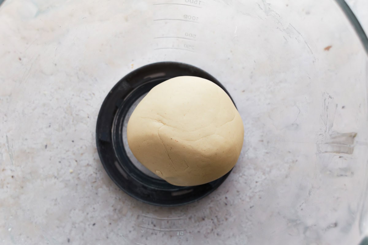 gluten-free croissant dough in a glass bowl.