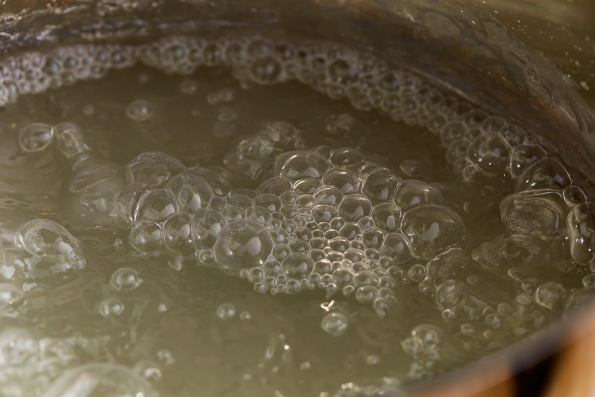 boiling water in a pot.