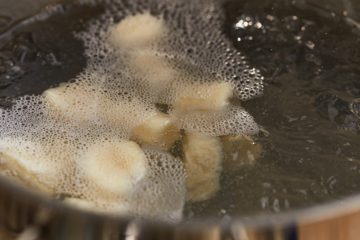 gluten free gnocchi boiling in water.