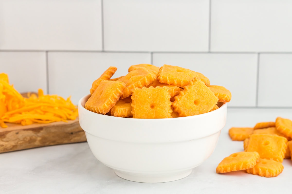 Side view of a bowl of gluten free cheez its.