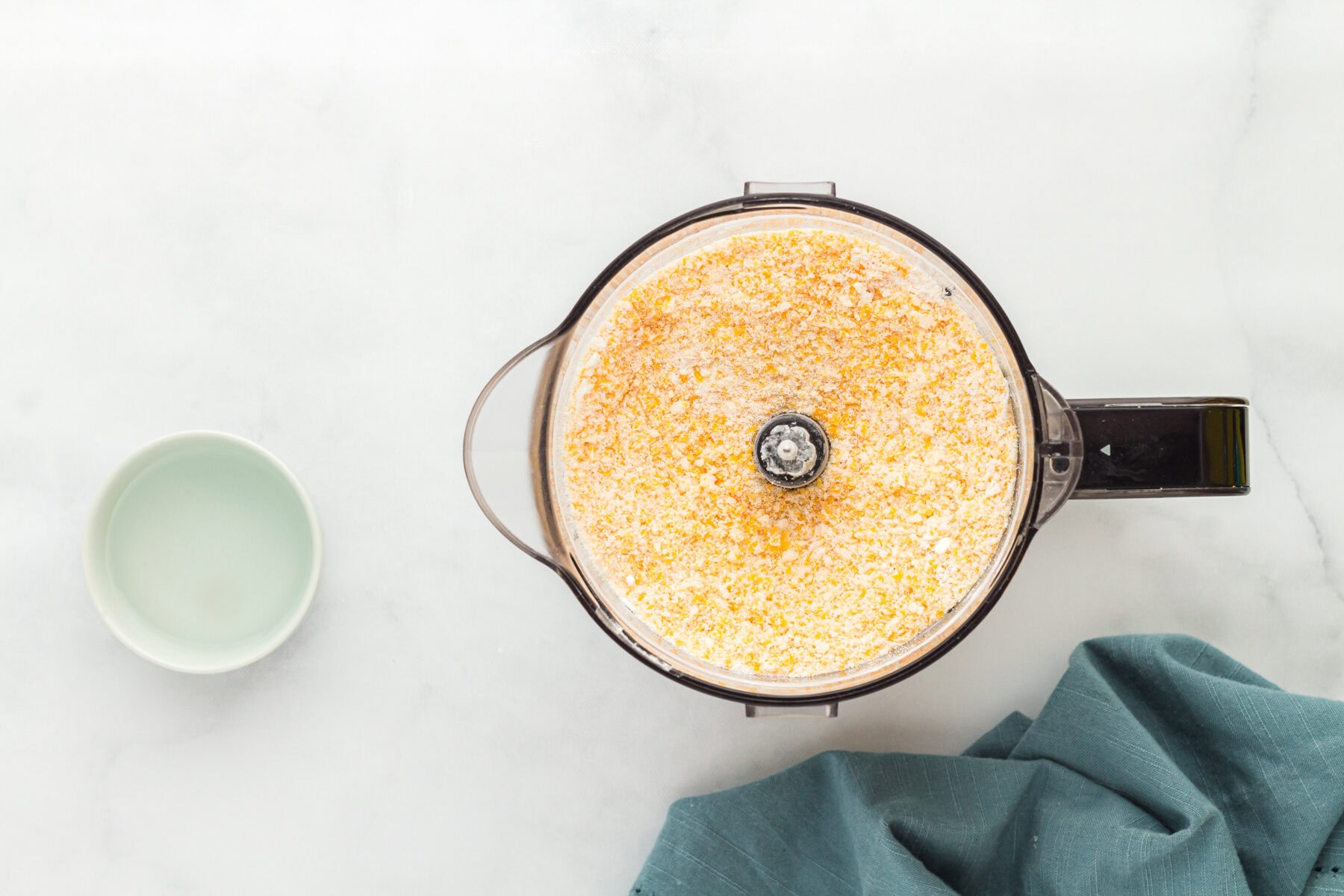 Blended mixture for gluten free cheez its in a blender.