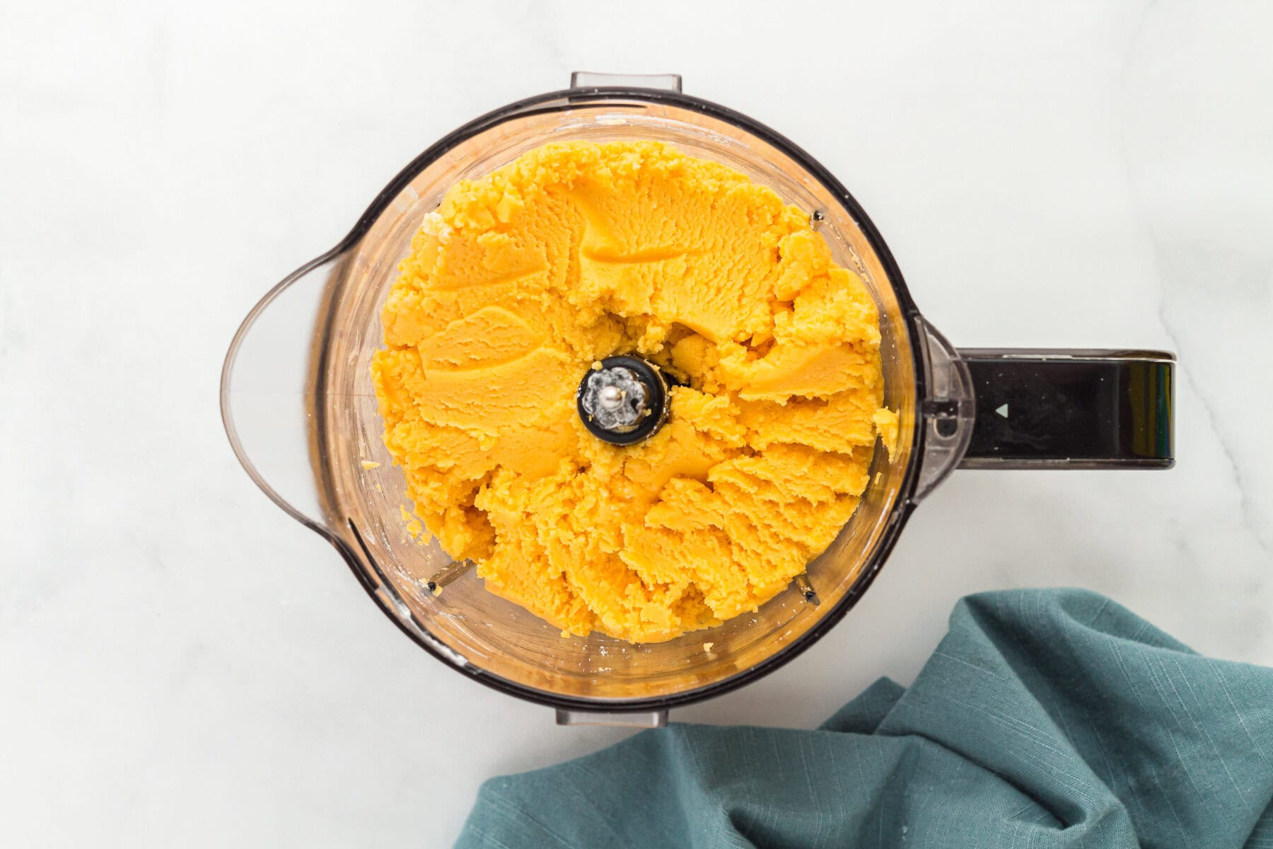 Gluten free cheez its dough in a blender.