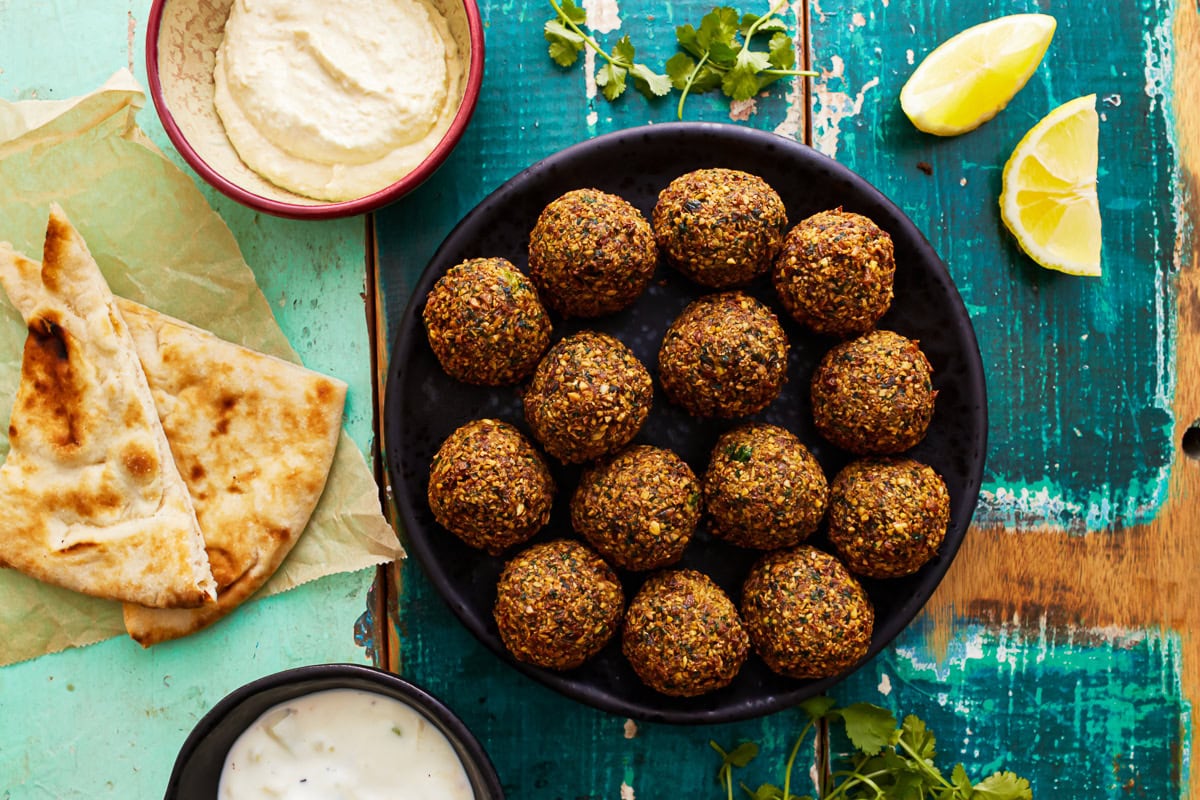 overhead view of gluten-free falafel balls on a plate.