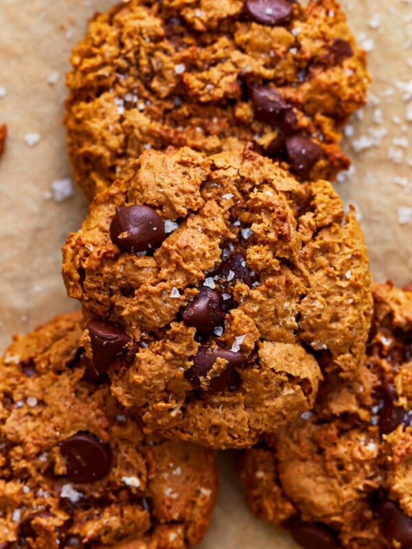 Close up of a stack of gluten-free peanut butter oatmeal cookies sprinkled with sea salt