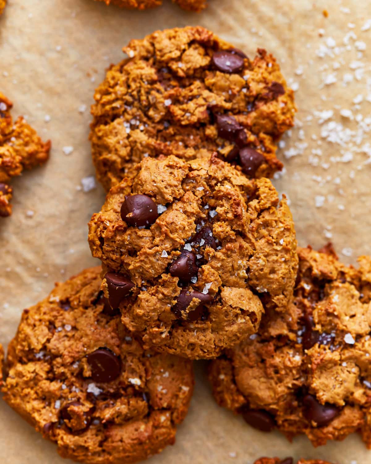 A stack of gluten-free peanut butter oatmeal cookies sprinkled with sea salt