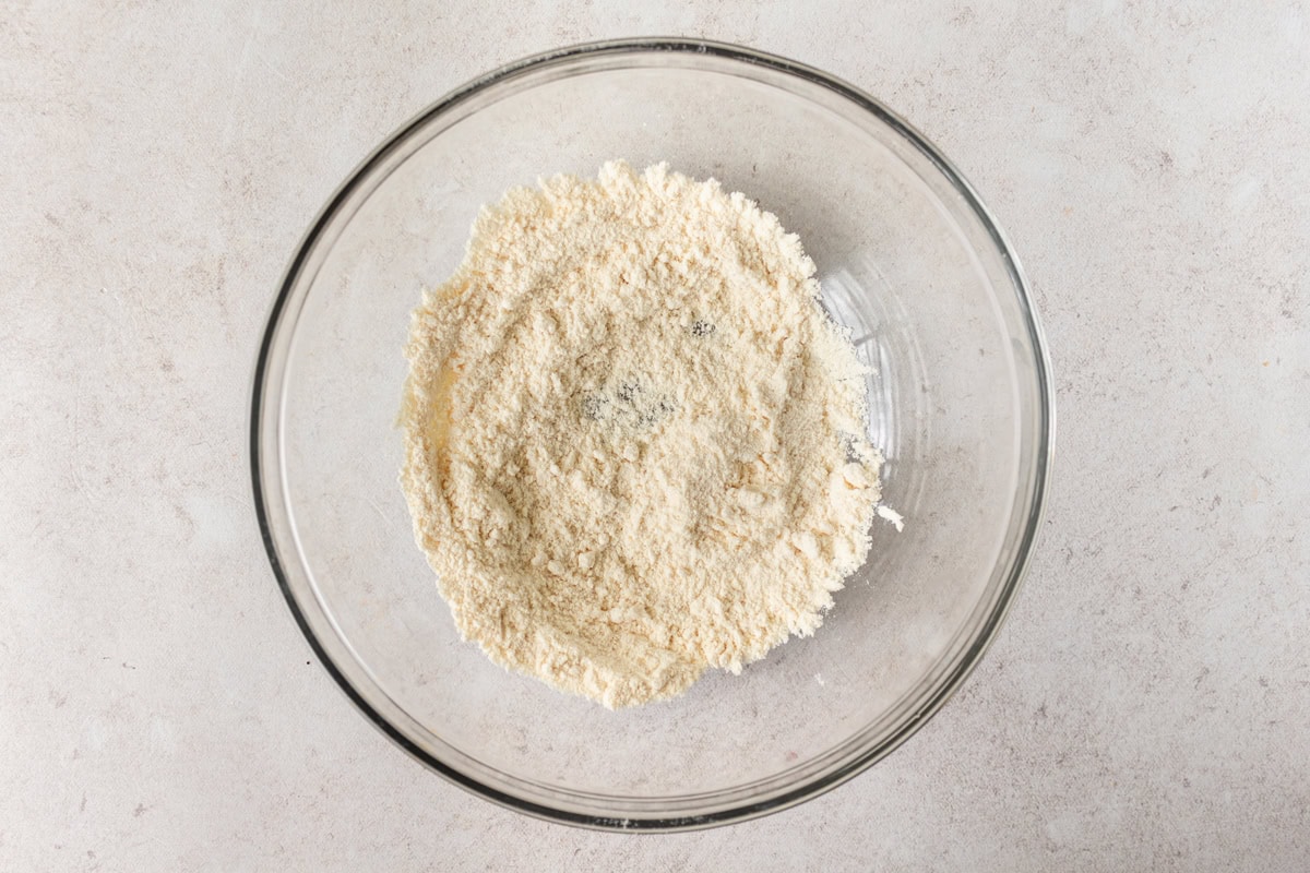 Coconut flour in a glass mixing bowl