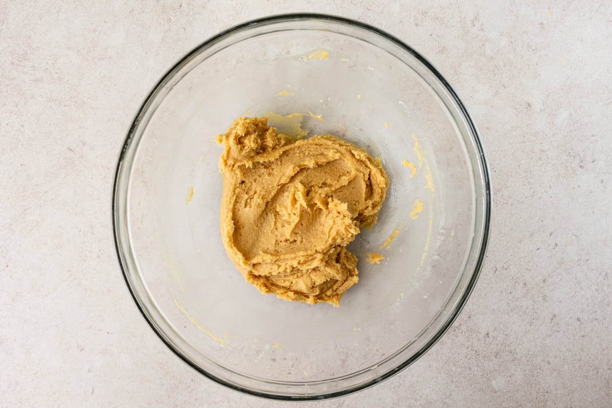 The dough for coconut flour chocolate chip cookies in a mixing bowl without chocolate chips added