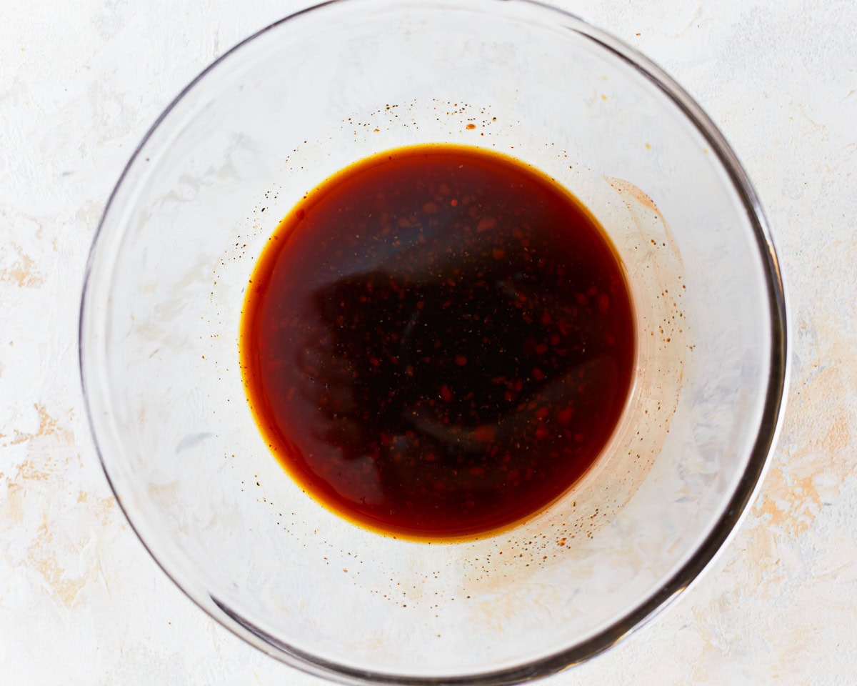 Pad thai sauce in a glass mixing bowl