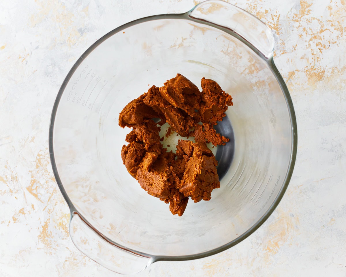 Peanut butter, brown sugar, and vanilla combined in a mixing bowl 