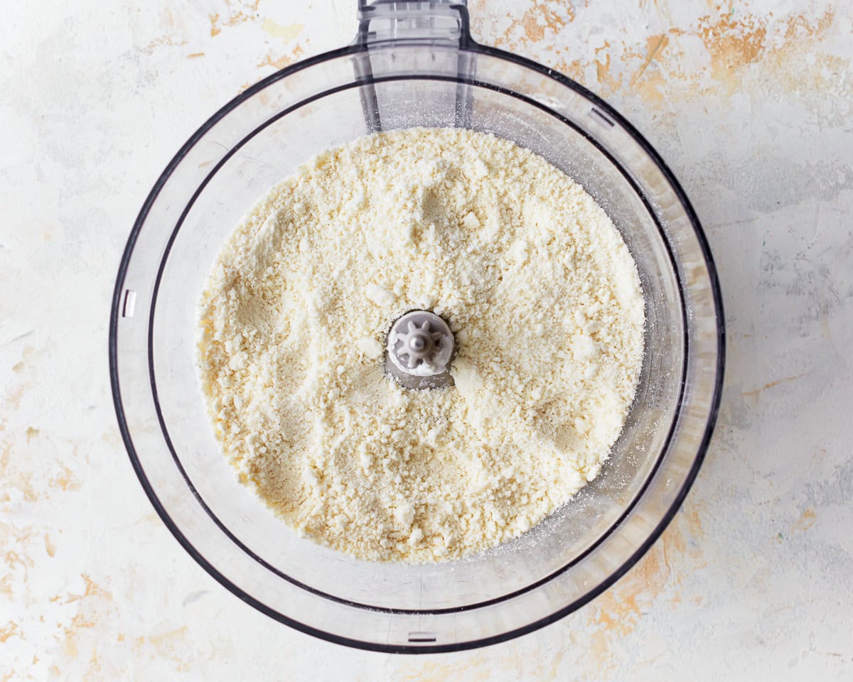 Dry ingredients for pandebono in a food processor