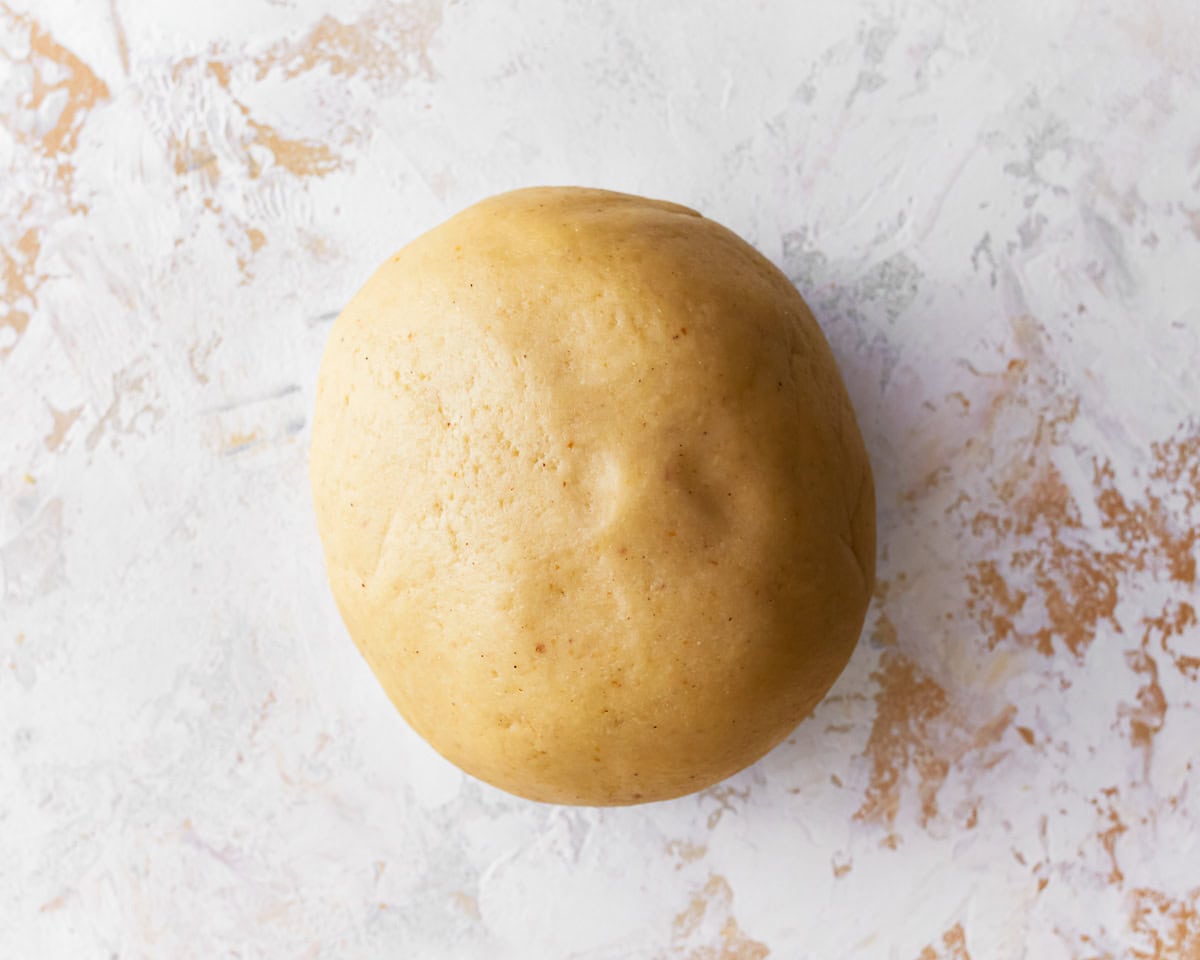 A ball of almond flour pasta dough