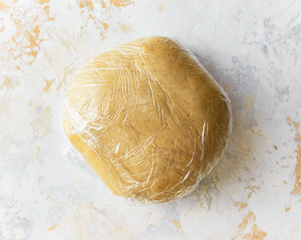 Gluten-free ravioli dough wrapped in plastic wrap.