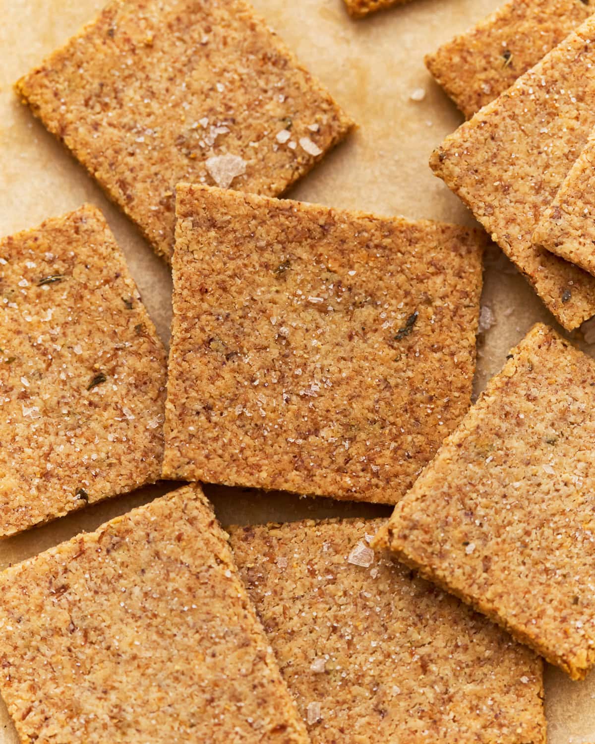 Almond flour crackers on parchment paper.