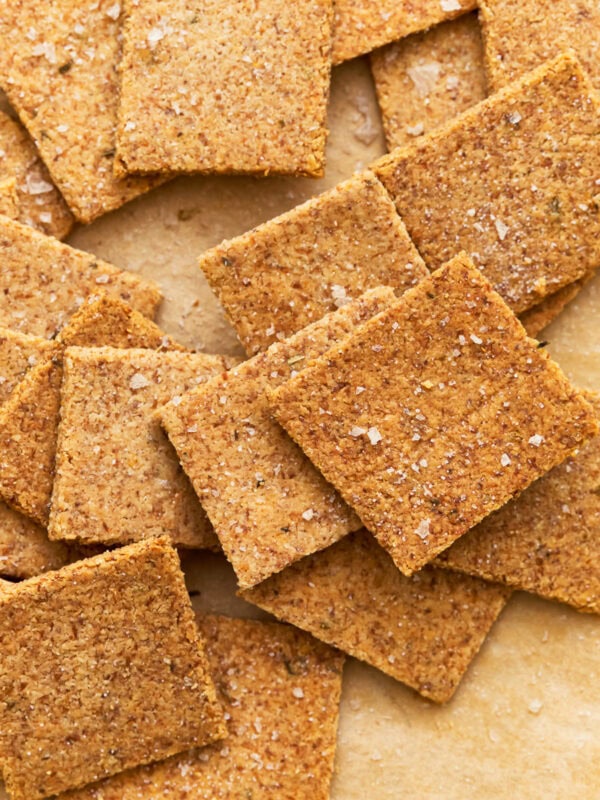 Almond flour crackers on parchment paper.