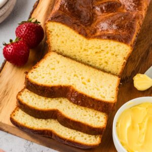 Overhead view of a sliced gluten-free brioche loaf.