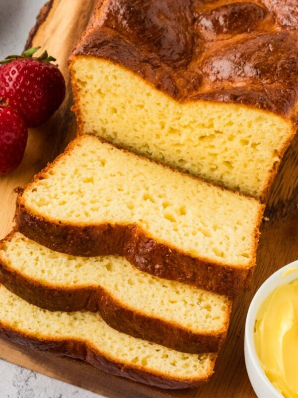 Overhead view of a sliced gluten-free brioche loaf.