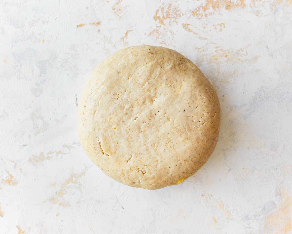 A ball of gluten-free puff pastry dough.