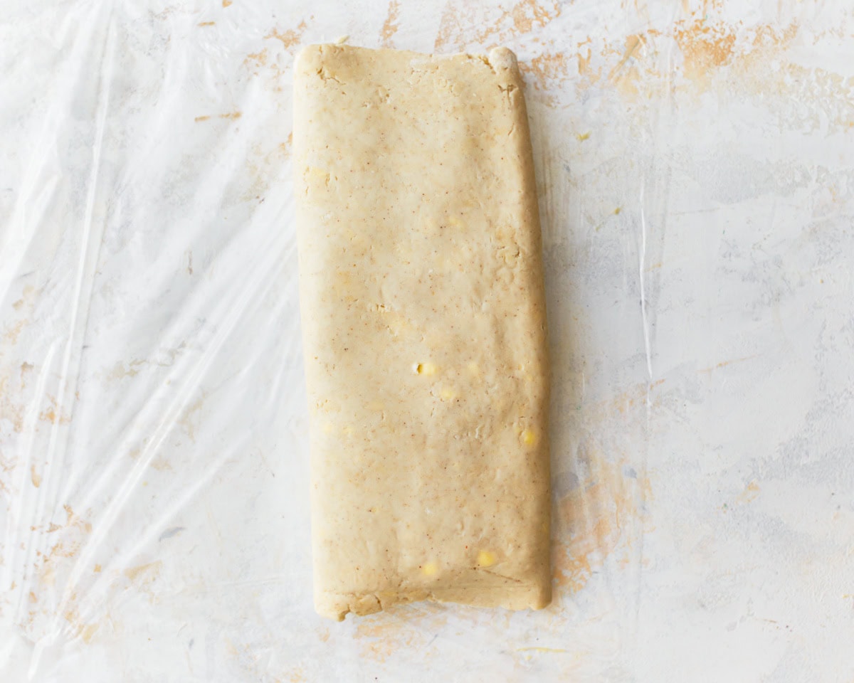 Gluten-free puff pastry dough folded into a rectangle.