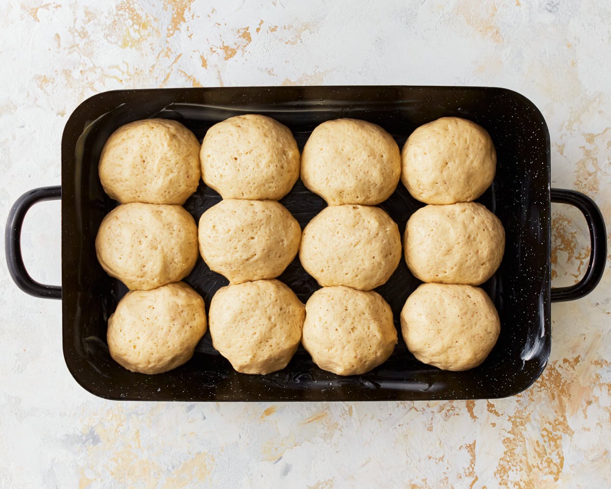 Gluten-free hawaiian roll dough in a baking pan.